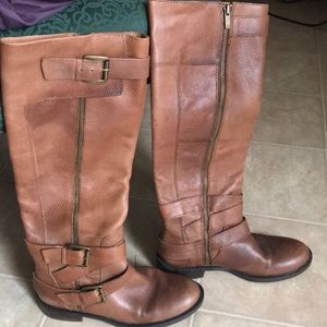 Nice brown leather boots . They have been worn but are still in good condition